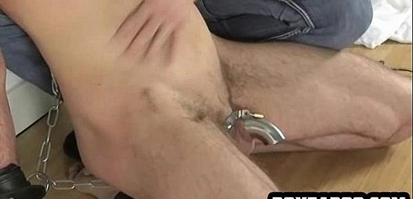  Hot stud wearing a chastity belt getting shaved